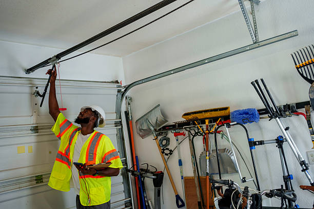 Professional Garage Door Panel Replacement technician working in South Farmingdale, NY